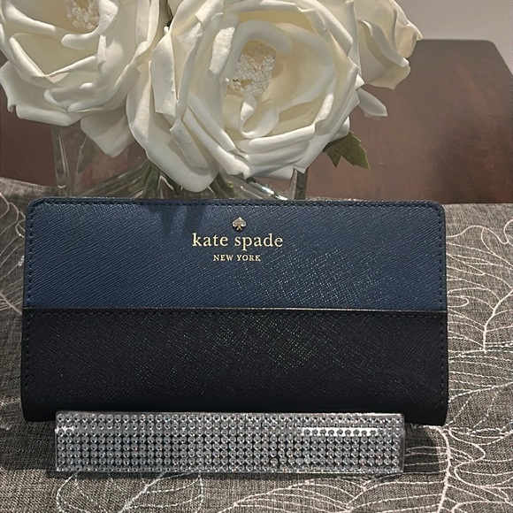 kate spade Handbags - Kate spade large slim bifold wallet NWT